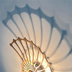 Elegante lampada da parete a conchiglia